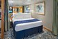 Owner´s Suite, ložnice - Grandeur of the Seas